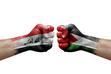 Two hands punch to each others on white background. Country flags painted fists, conflict crisis concept between iraq and jordan - obrazy, fototapety, plakaty
