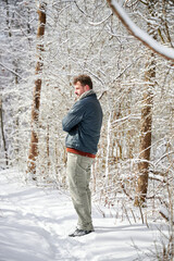 PITTSBURGH, PA, USA - FEBRUARY 5TH 2022: A handsome middle-aged man is hiking in the frozen winter...