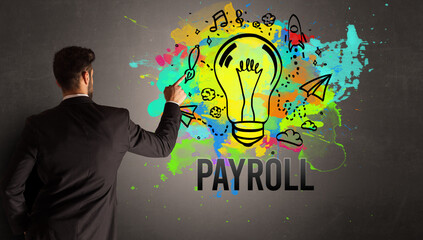 businessman drawing colorful light bulb