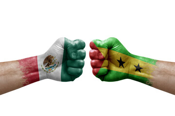 Two hands punch to each others on white background. Country flags painted fists, conflict crisis concept between mexico and sao tome and principe