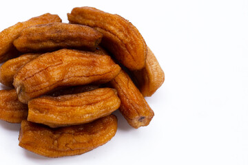 Sun-dried bananas on white background.