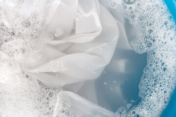 Soak a cloth before washing, white cloth