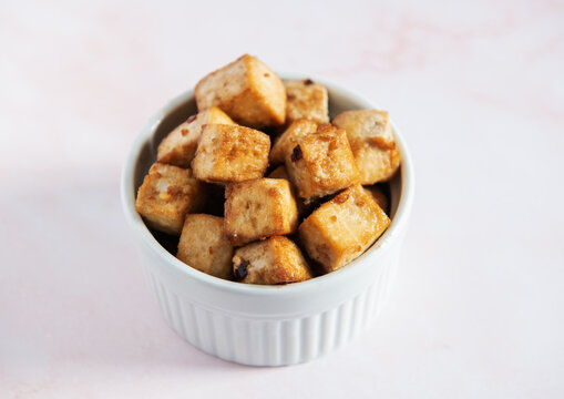 Baked Tofu with spices in a ramekin 