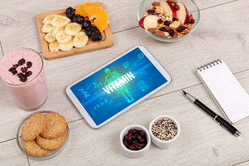 Tablet Pc with fruits, medical concept