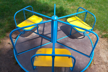Rotating swing in the playground 