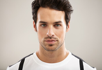 Fototapeta premium Focused on getting fit. Portrait of a handsome young man.