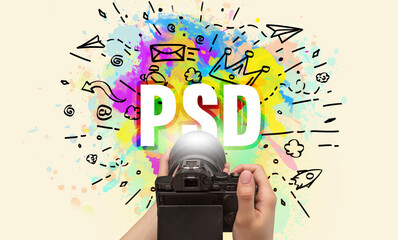Close-up of a hand holding digital camera with abstract drawing