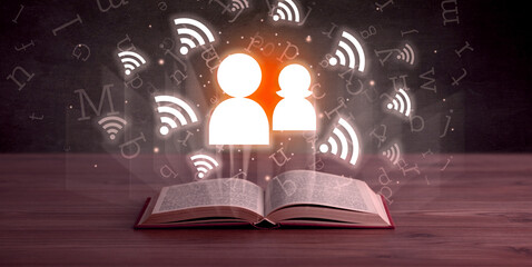 Open book with social networking icons above