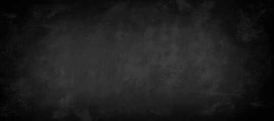 Wide chalkboard or black board texture abstract background with grunge dirt white chalk rubbed out on blank black billboard wall