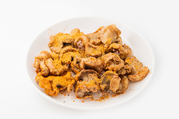 Fresh fried chicken comb oil on white background