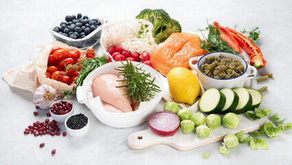 Healthy food assortment on light background.