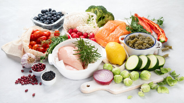 Healthy food assortment on light background.