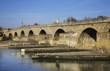 Fototapeta premium Stone Bridge over the Danube in Regensburg. Bavaria. Germany