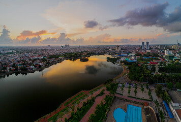 Obraz premium Haiphong, Vietnam Sep 2020 Aerial view of Haiphong City skyline during sunrise look from 300m height above Lach Tray Stadium