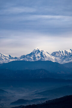Himalayan Peaks covered in snow, a view from Kausani, switzerland of India.