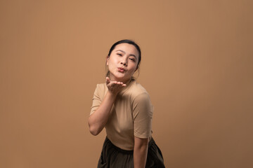 Obraz premium Woman in love isolated on beige background.