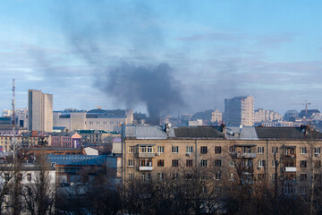 Kharkiv, Ukraine. City center, day 4 of Russia's attack on Ukraine. Black smoke over the city. The photo was taken on February 27, 2022, Kovalskaya street, Kharkiv, Ukraine.
