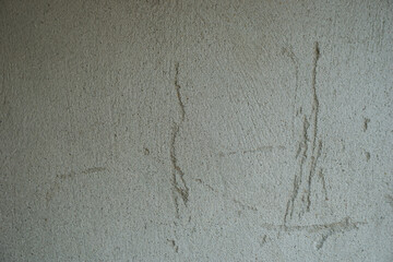 cracked cement covered with gray cement surface as background for design
