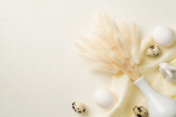 Top view photo of easter decorations white vase with lagurus flowers ceramic easter bunny quail eggs and cloth on isolated white background with empty space