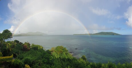 Semicircle rainbow over the sea