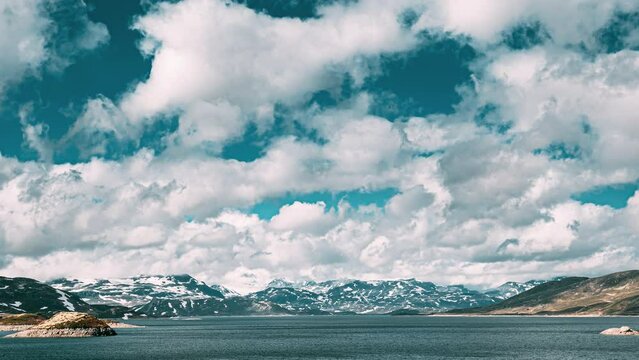 Oppland, Tyin Lake, Norway. Stones On Coast Of Beautiful Lake Tyin In Summer Day. Norwegian Nature. 4K.