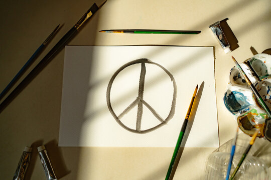 Peace symbol was drawn on a white paper