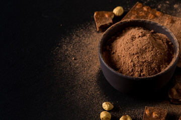 Сocoa powder  and chocolate nuts pieces