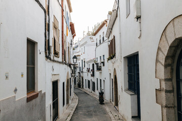 Fototapeta na wymiar Old side street in Sitges, Spain