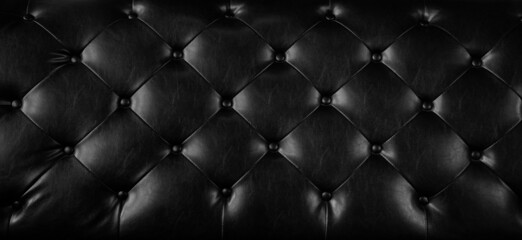 Black leather texture background. Artificial leather used for making bags, pad, sofa
