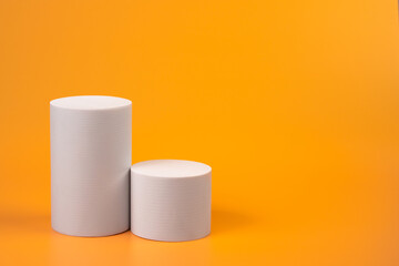 Orange product background. Empty podium	