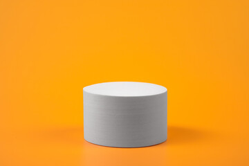Orange product background. Empty podium	