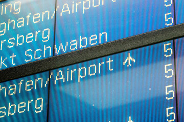 Detail view on airplane flight arrival sign