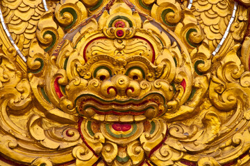 Fototapeta na wymiar Thai style molding art at the wall of thai temple