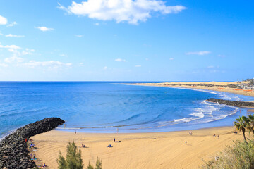 View at the Playa Del Ingles beach with the dunes in the background, Gran Canaria - Spain - obrazy, fototapety, plakaty