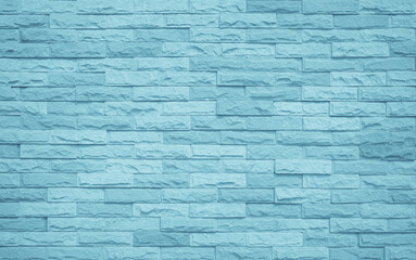 Brick wall painted with pale blue paint calm tone texture background. Pattern clean concrete grid uneven bricks design stack backdrop.