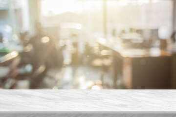 White marble table top and blurred abstract background from interior building backdrop with desk, counter work people in workplace.