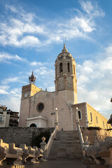 Fototapeta na wymiar Old church and landmark in Sitges, Spain. Church of Sant Bartomeu & Santa Tecla.