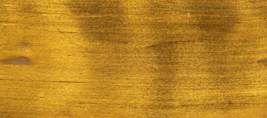 Naklejka premium Close up of pages of a book with golden edges, golden texture background