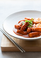 Tteokbokki, rice stick in spicy sauce, traditional korean cuisine, selective focus