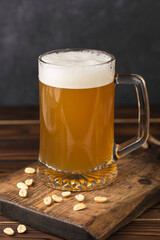 cold beer foam in a glass on a table