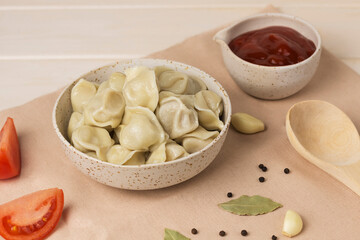 traditional pelmeni ravioli in bowl