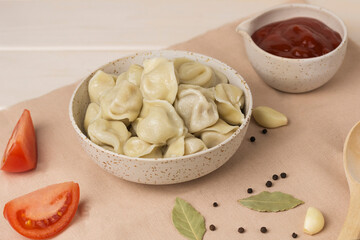 traditional russian pelmeni ravioli on table