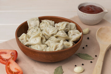 bowl of pelmeni ravioli