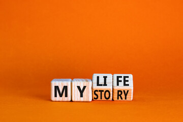 Story of my life symbol. Turned wooden cubes and changed concept words My story to My life. Beautiful orange table orange background. Business story of my life concept. Copy space. - obrazy, fototapety, plakaty
