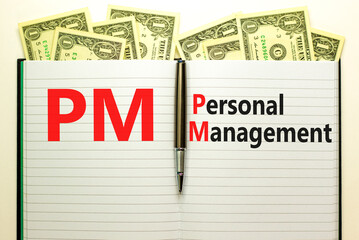 PM Personal management symbol. Concept words PM Personal management on white note. Metallic pen. Dollar bills. Beautiful white background. Business and PM personal management concept.