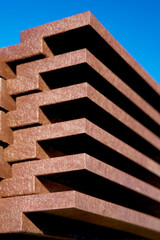 Pile of circular and sustainable construction material made from recycled waste plastics