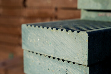 Pile of circular and sustainable construction material made from recycled waste plastics