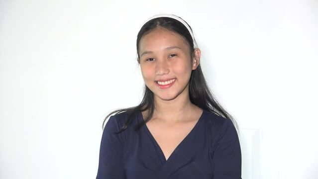 A Happy Filipina Teen Girl Wondering