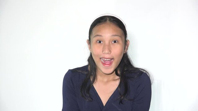 A Surprised Amazed Teen Asian Girl