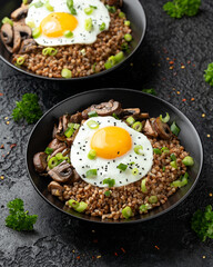 Bowl of Buckwheat with mushrooms, onion and egg. Healthy food